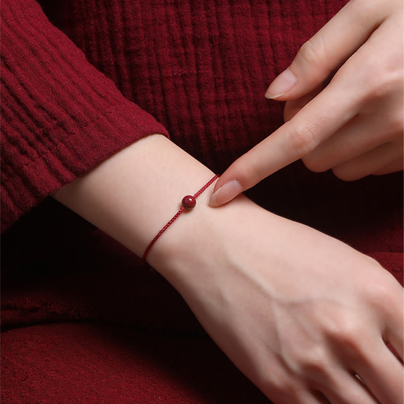 Armband Roter Achat Zinnober Segen rote Kordel zarte Perle Handgelenk