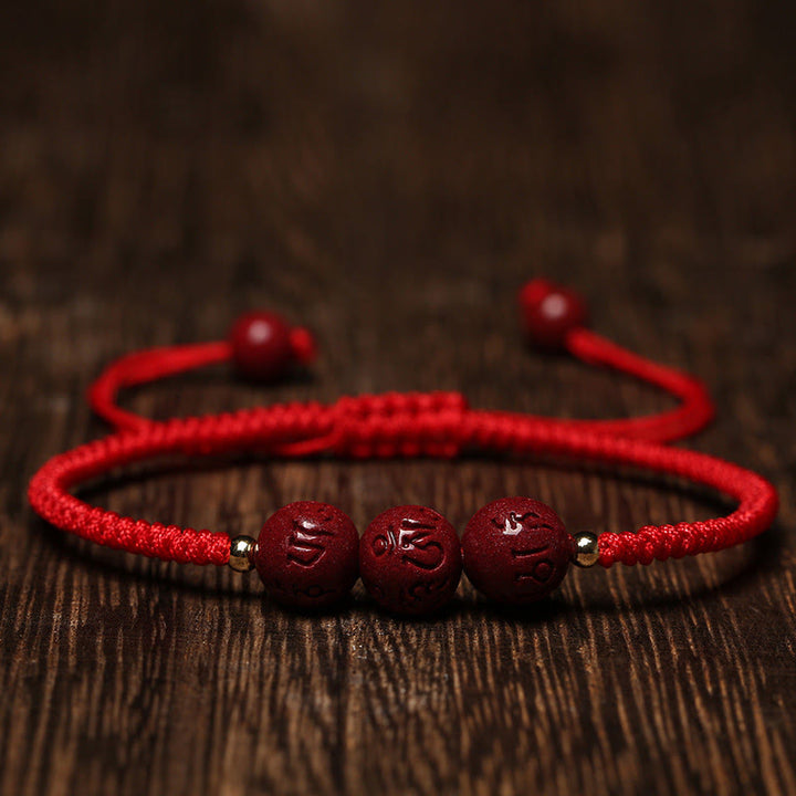 Armband Zinnober Om Mani Padme Hum