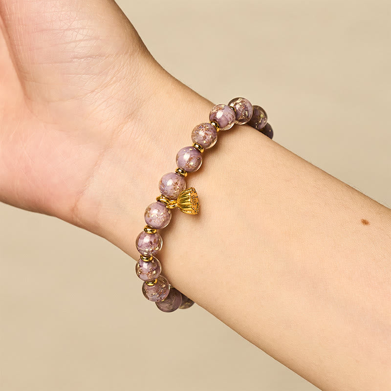 Armband Liuli – Glück & Energie violette Perlen Lotus Anhänger Handgelenk