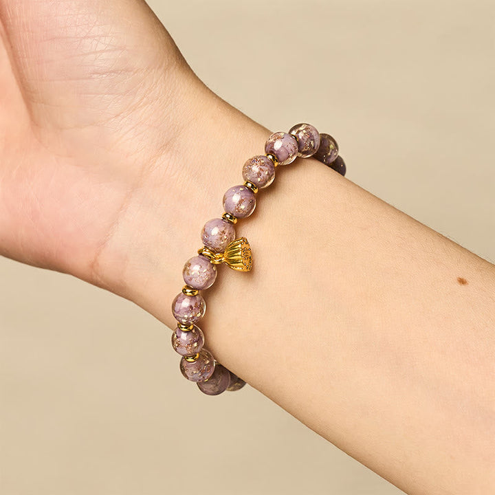 Armband Liuli – Glück & Energie violette Perlen Lotus Anhänger Handgelenk