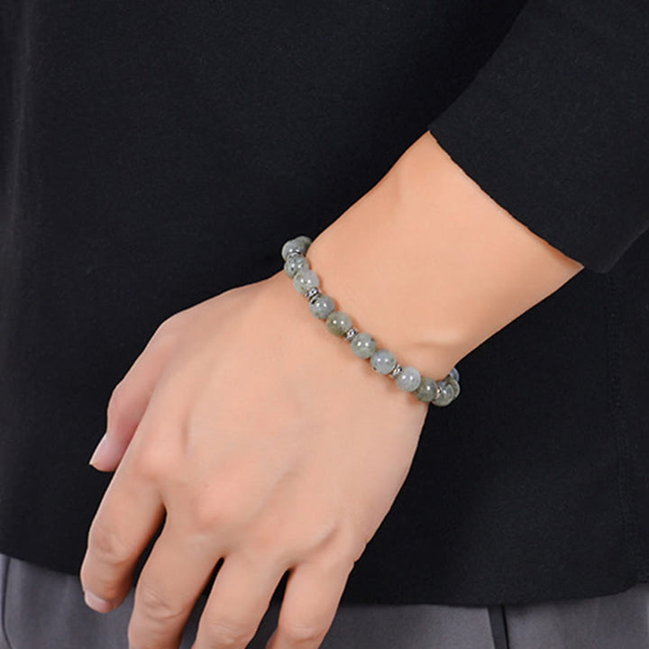 Armband Tigerauge Tiger Various Schutz am Handgelenk getragen graue Perlen