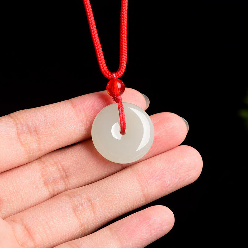 Jade Buddha Schnalle Kette Frieden rotes Seil weißer Anhänger