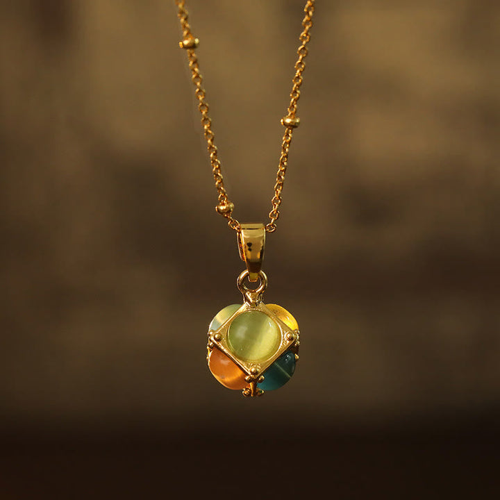 Gold Kette mit Katzenauge Würfel Anhänger grün orange türkis Schutz
