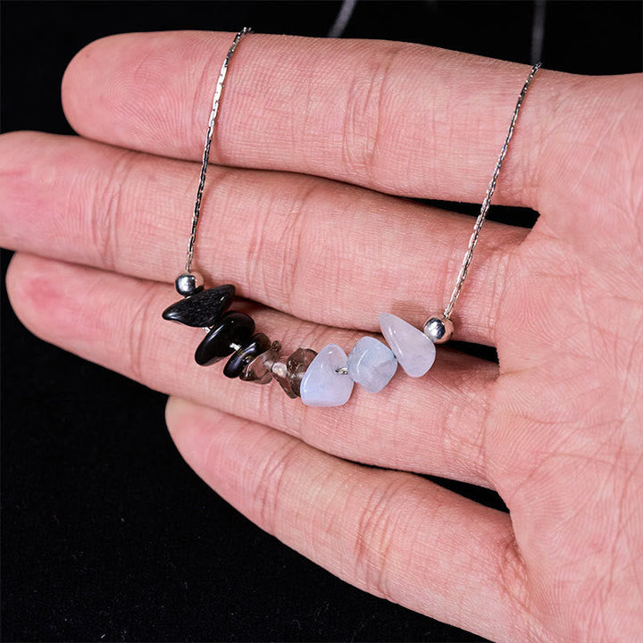 Schwarzer Obsidian Rosenquarz Kette natürliche Edelsteine auf Hand Stärke