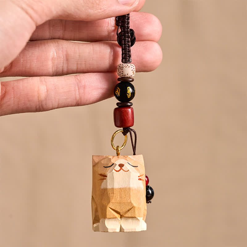 Schlüsselanhänger Om Mani Padme Hum Katze Holz handgeschnitzt spirituell Glücksbringer
