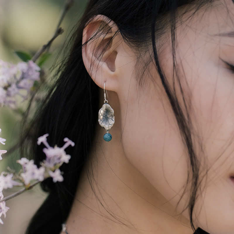 Ohrringe Türkis Lotusblatt Schutz Silber getragen Boho Schmuck spirituell