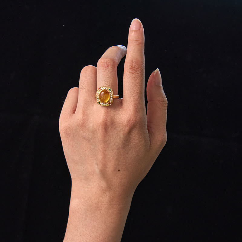 Bernstein Blume Quadrat Ring golden gefasst eleganter Schmuck Fingerring