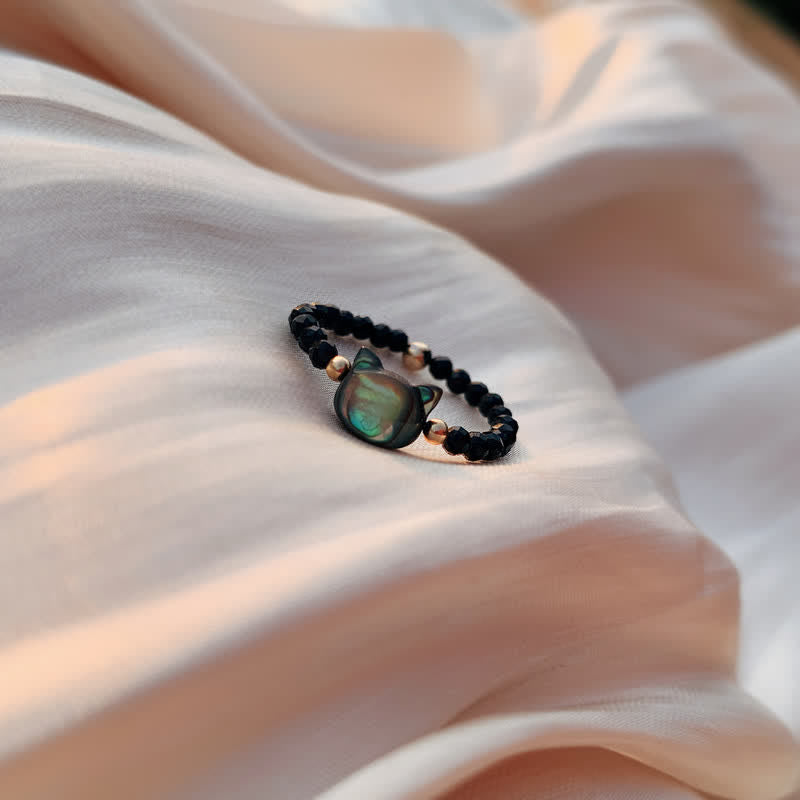 Tridacna Katze Ring – Segen schwarzes Perlenband Fengshui Glück