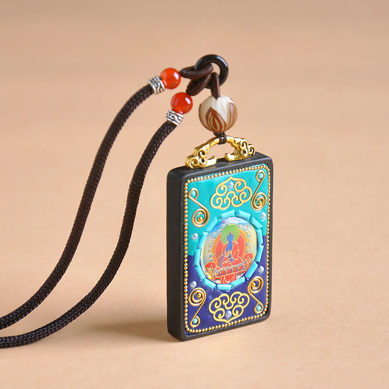 Medizin-Buddha Anhänger an geflochtener Ebenholz Kette mit roten Perlen