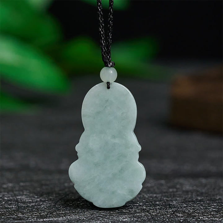 Grüne Jade Kwan Yin Anhänger an schwarzer Kette Harmonie