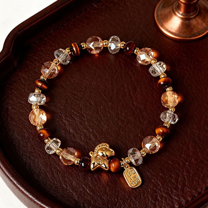 Armband Tigerauge Obsidian Glück Wohlstand Energie Pixiu goldener Anhänger Lederschale