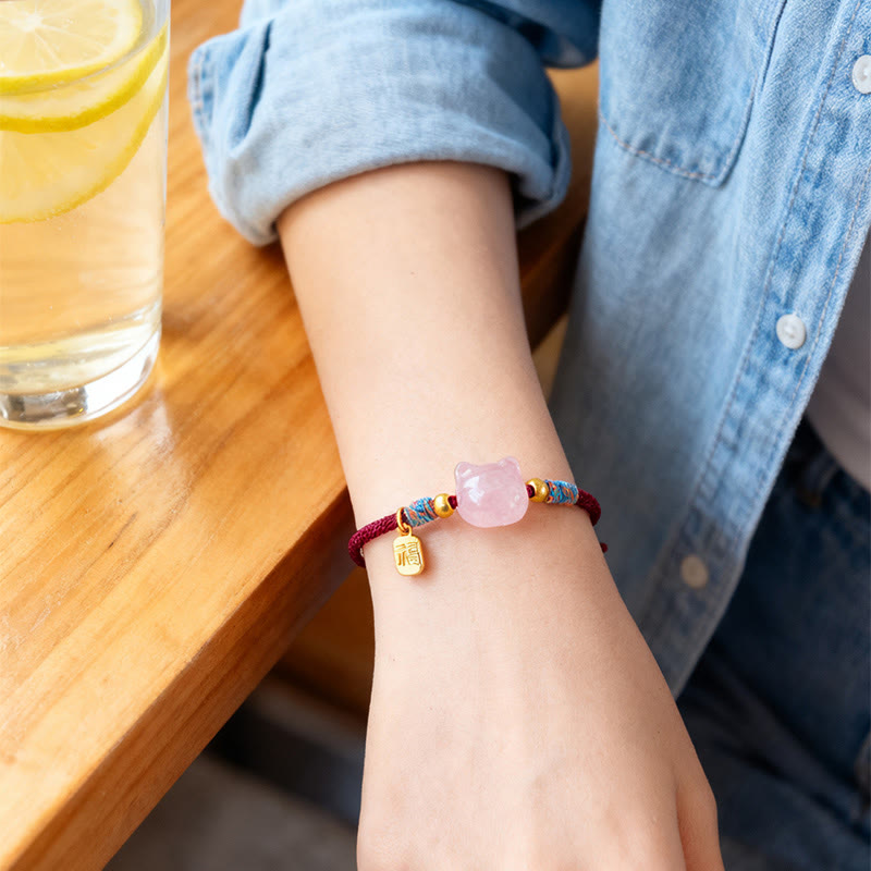 Armband Rosenquarz Pixiu Fu-Zeichen Schutz Glück am Handgelenk getragen