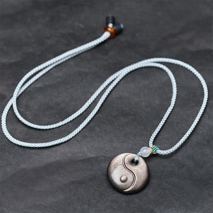 Obsidian Yin Yang Anhänger an weißer Kette Naturstein Schutz