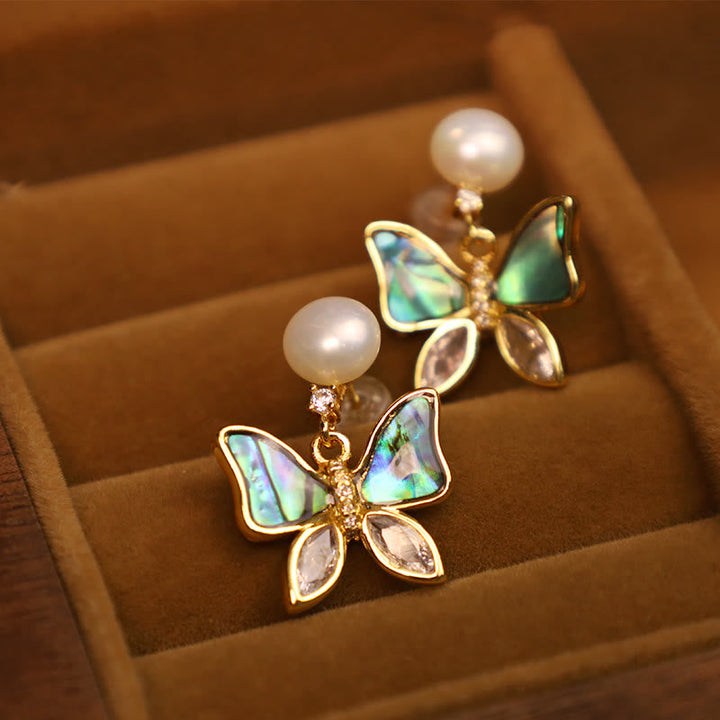 Ohrringe Perle Schmetterling Aufrichtigkeit Abalone gold Schmuckschatulle elegant spirituell