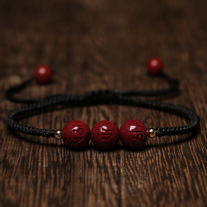 Armband Zinnober Om Mani Padme Hum