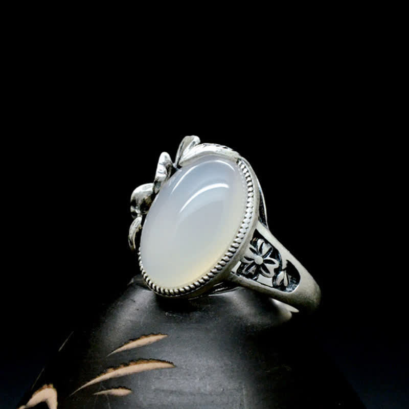 Ring Chalcedon Pflaumenblüte silbern Positivität Harmonie elegant Edelstein Schmuck