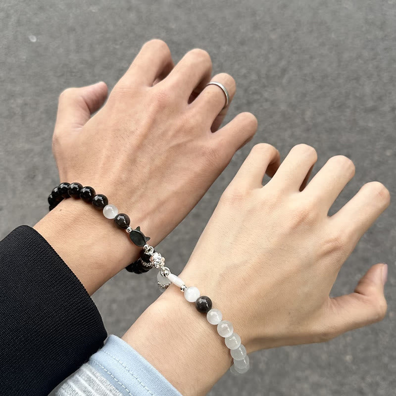 Armband Silber Obsidian Katze Positivität Paar getragen Handgelenk Mondstein