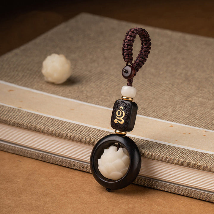 Schlüsselanhänger Bodhi Lotus Ebenholz handgeflochten spirituell Glücksbringer Anhänger