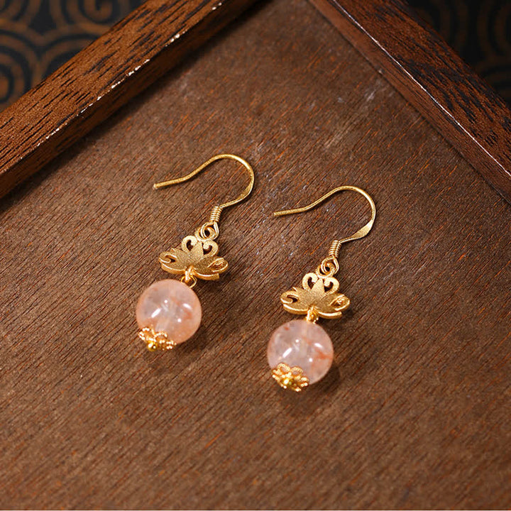 Ohrringe Citrin Lotus goldfarben Boho Schmuck spirituell Ohrhänger Edelstein