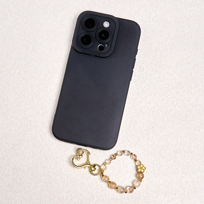 Schlüsselanhänger Super Seven Kristall Blüte goldene Blume Smartphone Accessoire spirituell