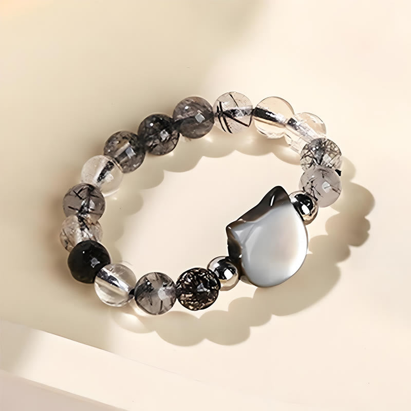 Rutilquarz Ring mit Tridacna und schwarzen Perlen Armband Schutz Glück