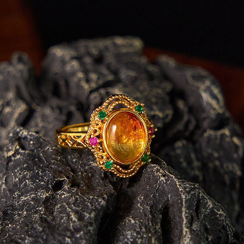Eleganter Ring Bernstein Blume Gold gefasst mit Smaragd und Rubinen