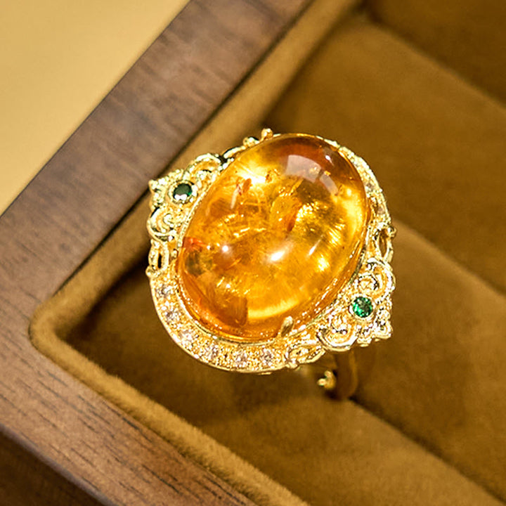 Bernstein Ring Blume Ornament Gold Eleganz Klarheit Kraft Schmuck