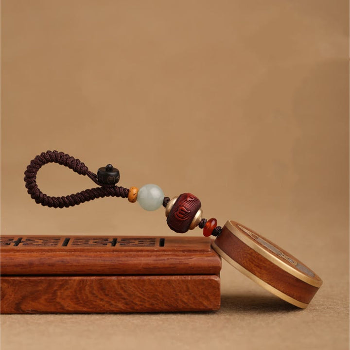 Schlüsselanhänger Buddha Ebenholz Balance Jade Perle Feng Shui Glücksbringer spirituell