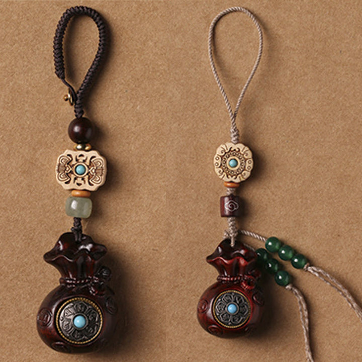 Schlüsselanhänger Sandelholz Om Mani – Ruhe Glücksbeutel Türkis spirituell Talisman