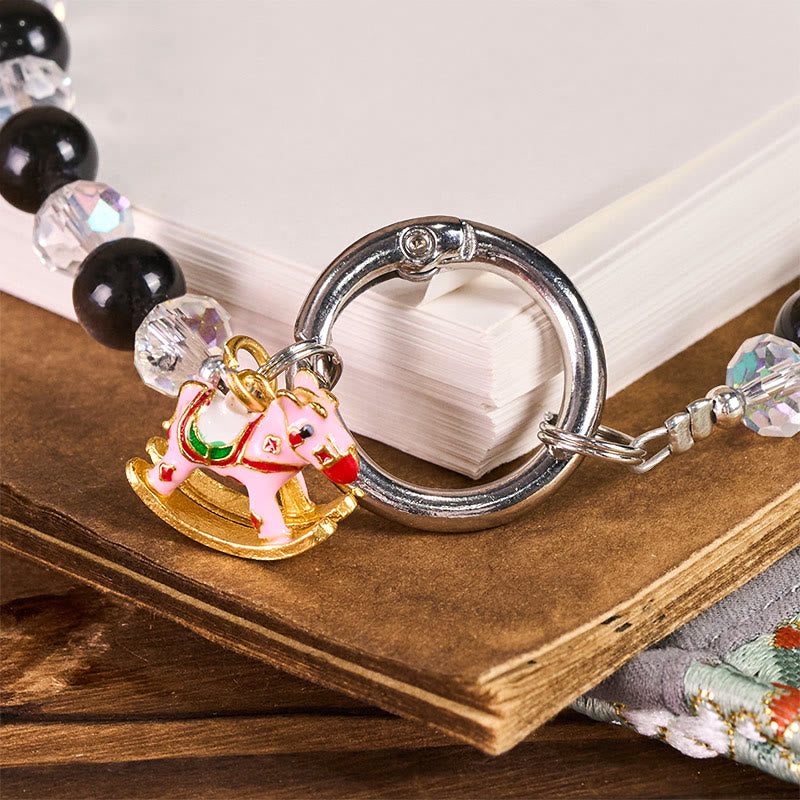 Schlüsselanhänger Pferd Obsidian Schutz Schaukelpferd rosa Glücksbringer spirituell Geschenk