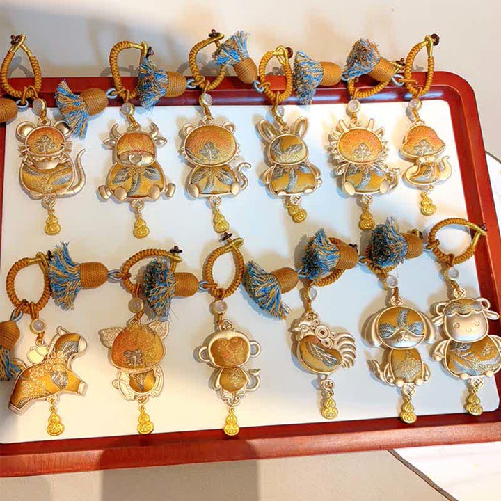 Schlüsselanhänger Tierkreis Brokat Quaste chinesisches Sternzeichen Glücksbringer spirituell Geschenk