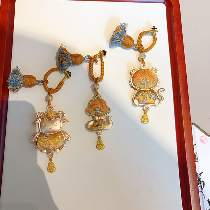 Schlüsselanhänger Tierkreis Brokat Quaste Gold Glücksbringer chinesisches Sternzeichen spirituell