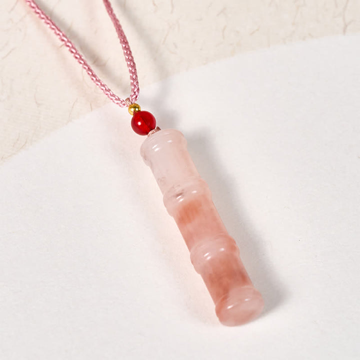 Rosenquarz Anhänger an rosa Kette mit roter Perle Naturstein Schmuck