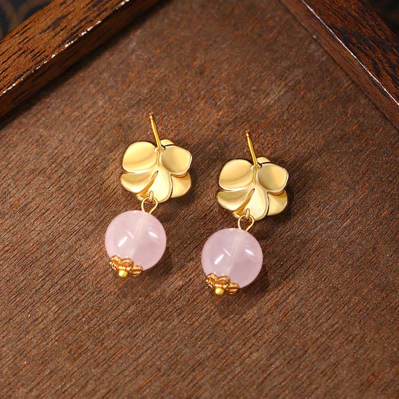 Ohrringe Rosenquarz Kamelie goldene Blüte Holz Boho Schmuck spirituell