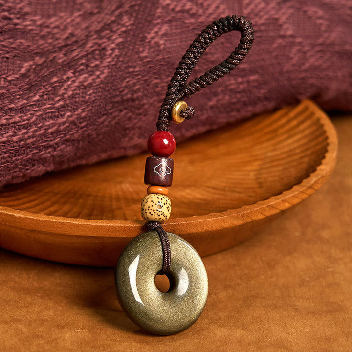 Schlüsselanhänger Goldobsidian Friedensschnalle Bodhi Perlen spirituell handgeknüpft Glücksbringer
