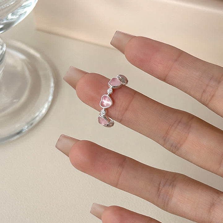 Ring 925 Silber rosa Katzenauge Herz Liebe am Finger getragen