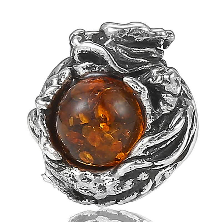 Ohrringe Bernstein Drache Silber Nahaufnahme Schmuck spirituell Erfolg Schutz