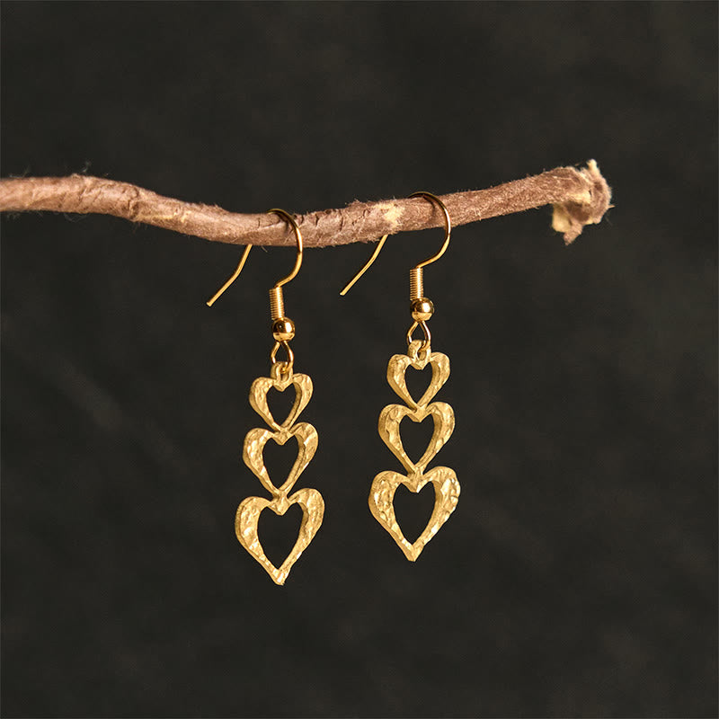 Herz Ohrringe Titanstahl Hammerschlag gold Boho Schmuck spirituell Ohrhänger