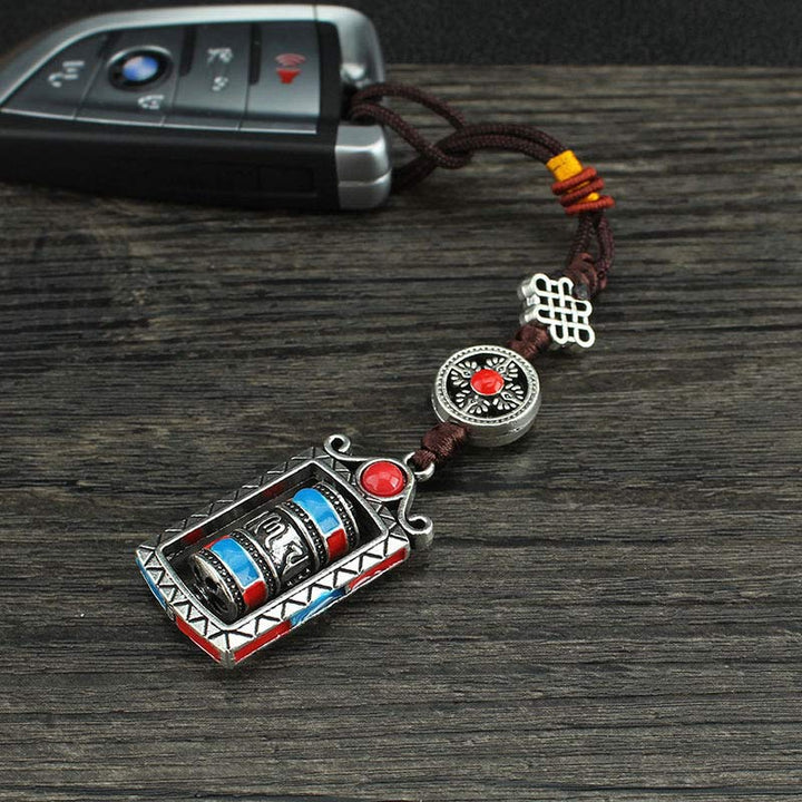Schlüsselanhänger Om Mani Gebetsmühle Silber tibetisch Glücksknoten spirituell Talisman