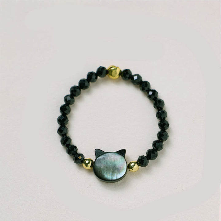 Schwarzer Perlen Armband Ring Tridacna Katze Segen Glück