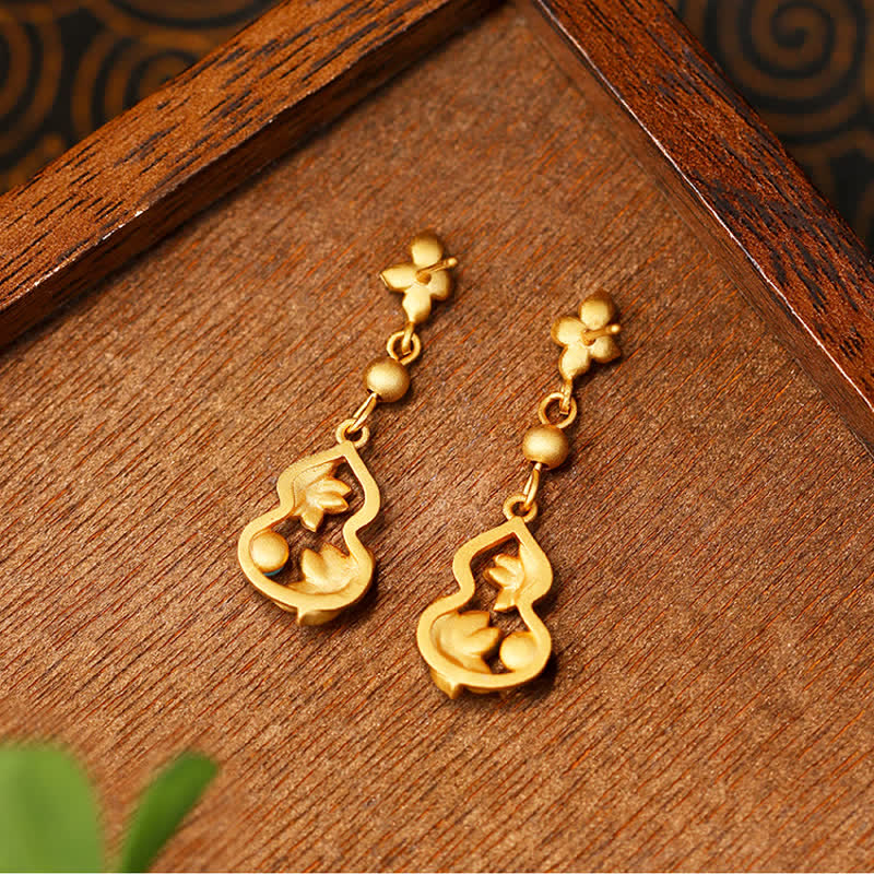 Ohrringe Kürbis Lotus goldfarben Holz Boho Schmuck spirituelle Ohrhänger