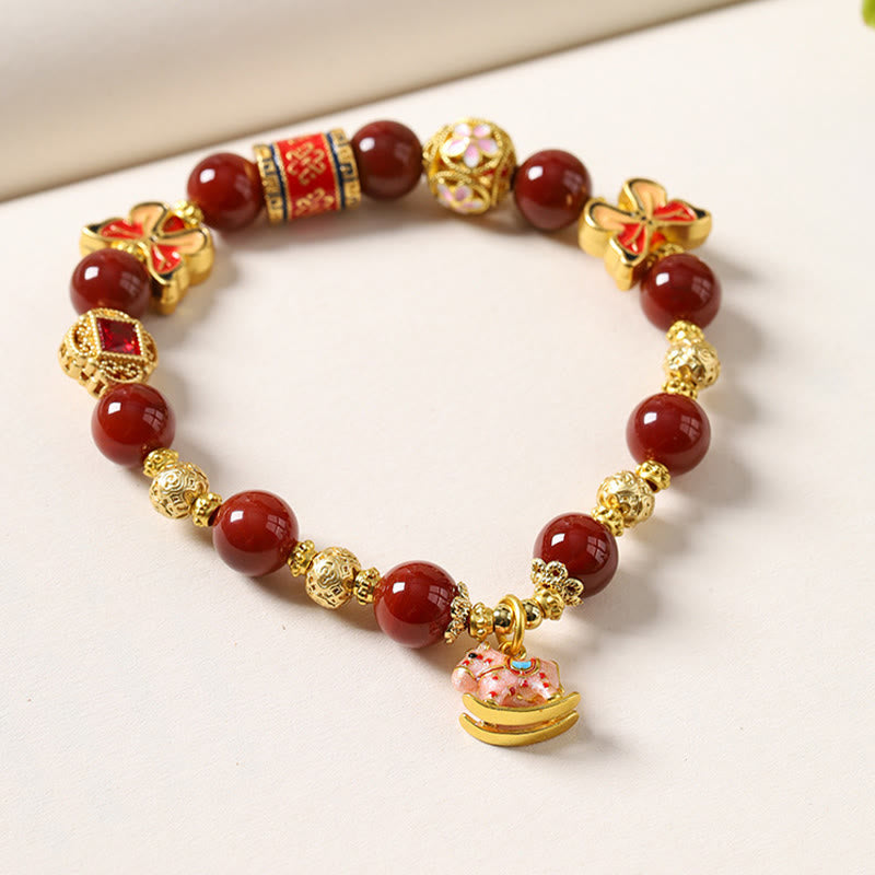 Armband Turmalin Roter Achat – Erfolg mit goldenen Perlen und Glücksanhänger