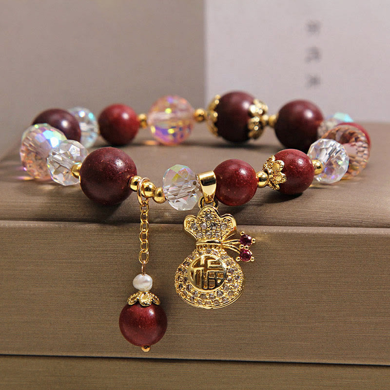 Armband Sandelholz Fu-Zeichen Schutz Glück goldener Glücksbeutel rote Perlen
