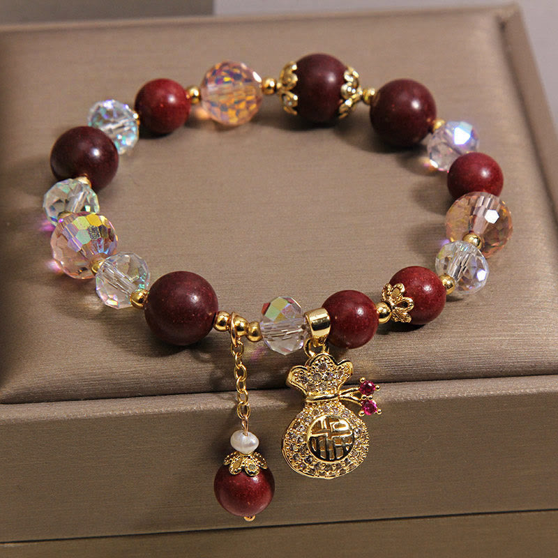 Armband Sandelholz Fu-Zeichen Schutz Glück mit Kristallperlen und goldenem Glücksbeutel-Anhänger
