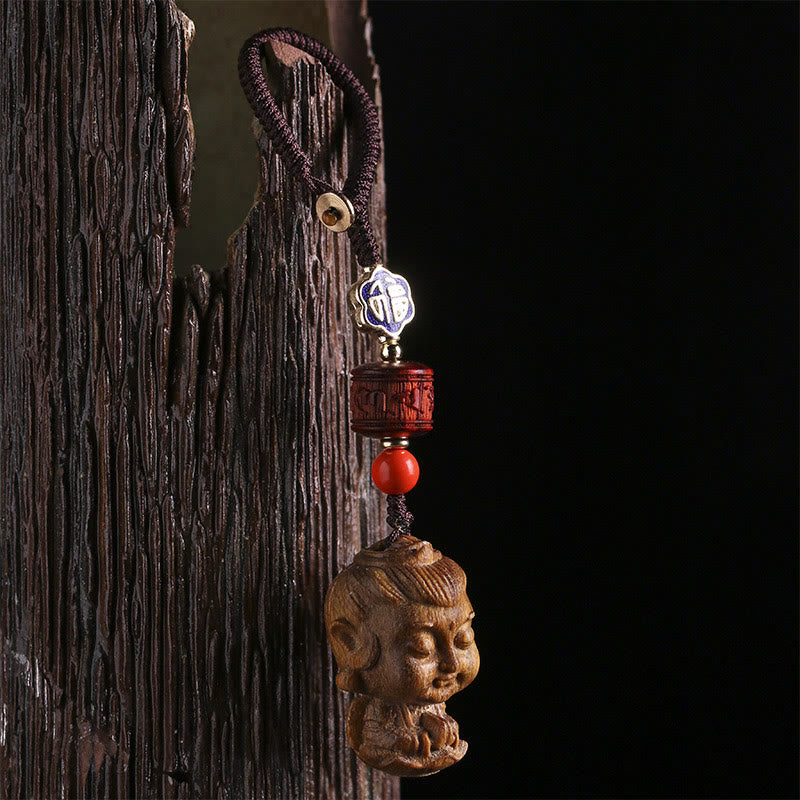 Schlüsselanhänger Buddha Sandelholz Om Mani Cloisonné Perle handgeschnitzt spirituell