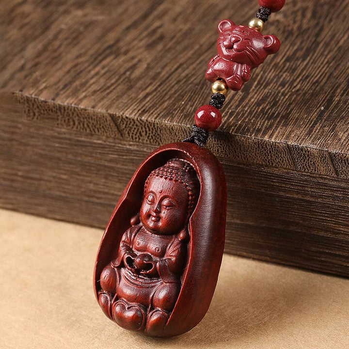 Schlüsselanhänger Buddha Sandelholz Tierkreis Tiger geschnitzt rot spirituell Glücksbringer