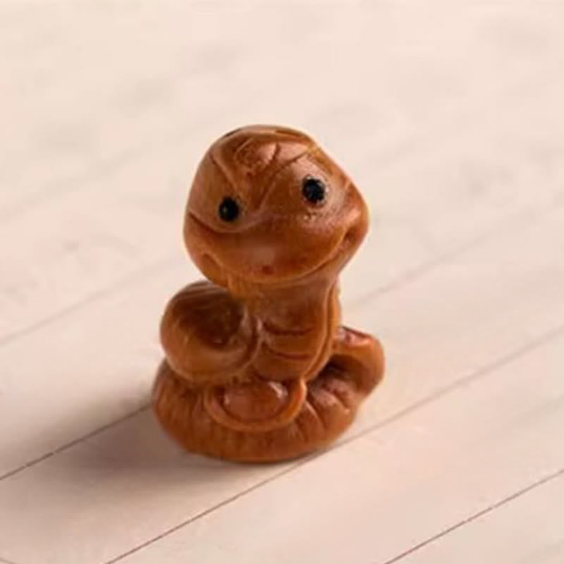 Schlüsselanhänger Sandelholz Bodhi Pferd Schlange Figur handgeschnitzt spirituell Glücksbringer