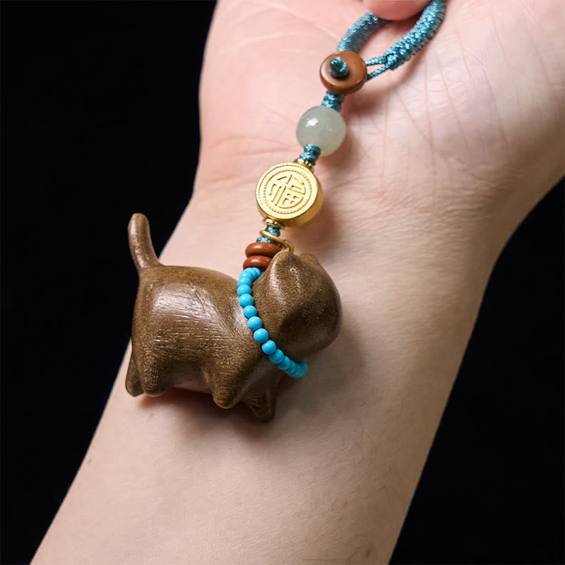 Schlüsselanhänger Jade Sandelholz Fu-Zeichen Hund Glücksbringer Feng Shui spirituell