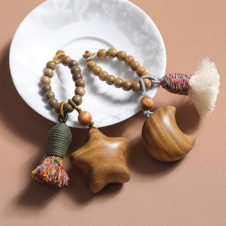 Schlüsselanhänger Sandelholz Stern Mond Holzperlen Quaste handgefertigt spirituelles Geschenk