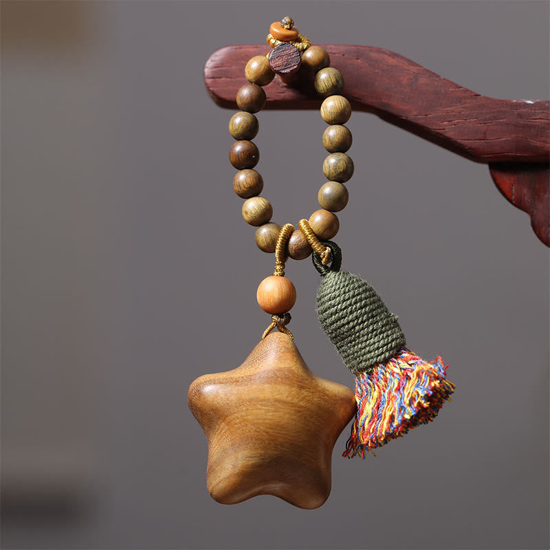 Schlüsselanhänger Sandelholz Stern Mond Holzperlen Quaste Boho spiritueller Glücksbringer